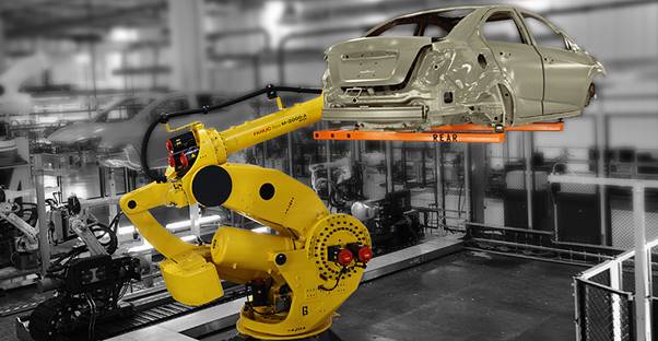 A photo of a robot manufacturing a car